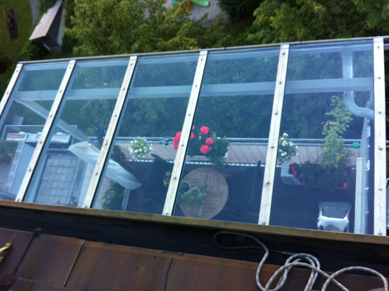 Glasreinigung Balkonüberdachung